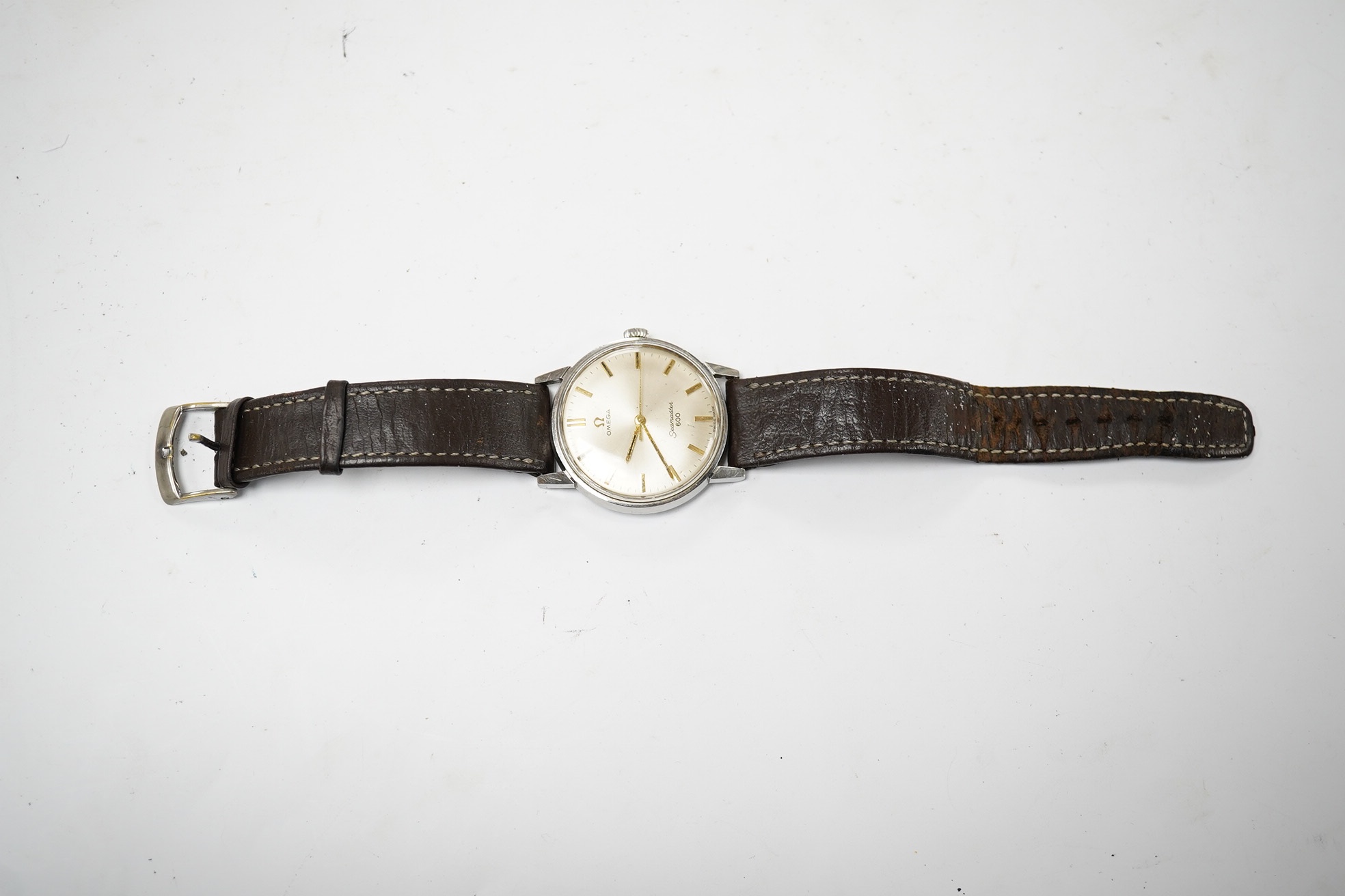 A gentleman's 1960's? stainless steel Omega Seamaster 600 manual wind wrist watch, with baton numerals, case diameter 34mm, on associated leather strap. Condition - poor to fair